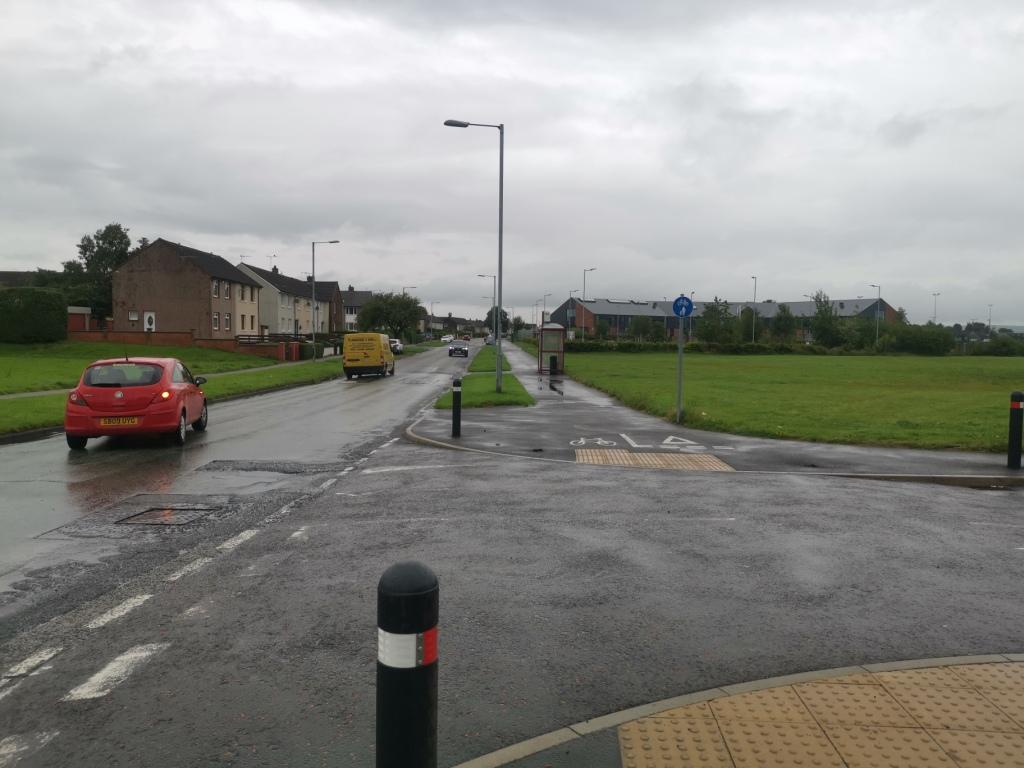 Alloway road showing the shared path going between the bus shelter and the road