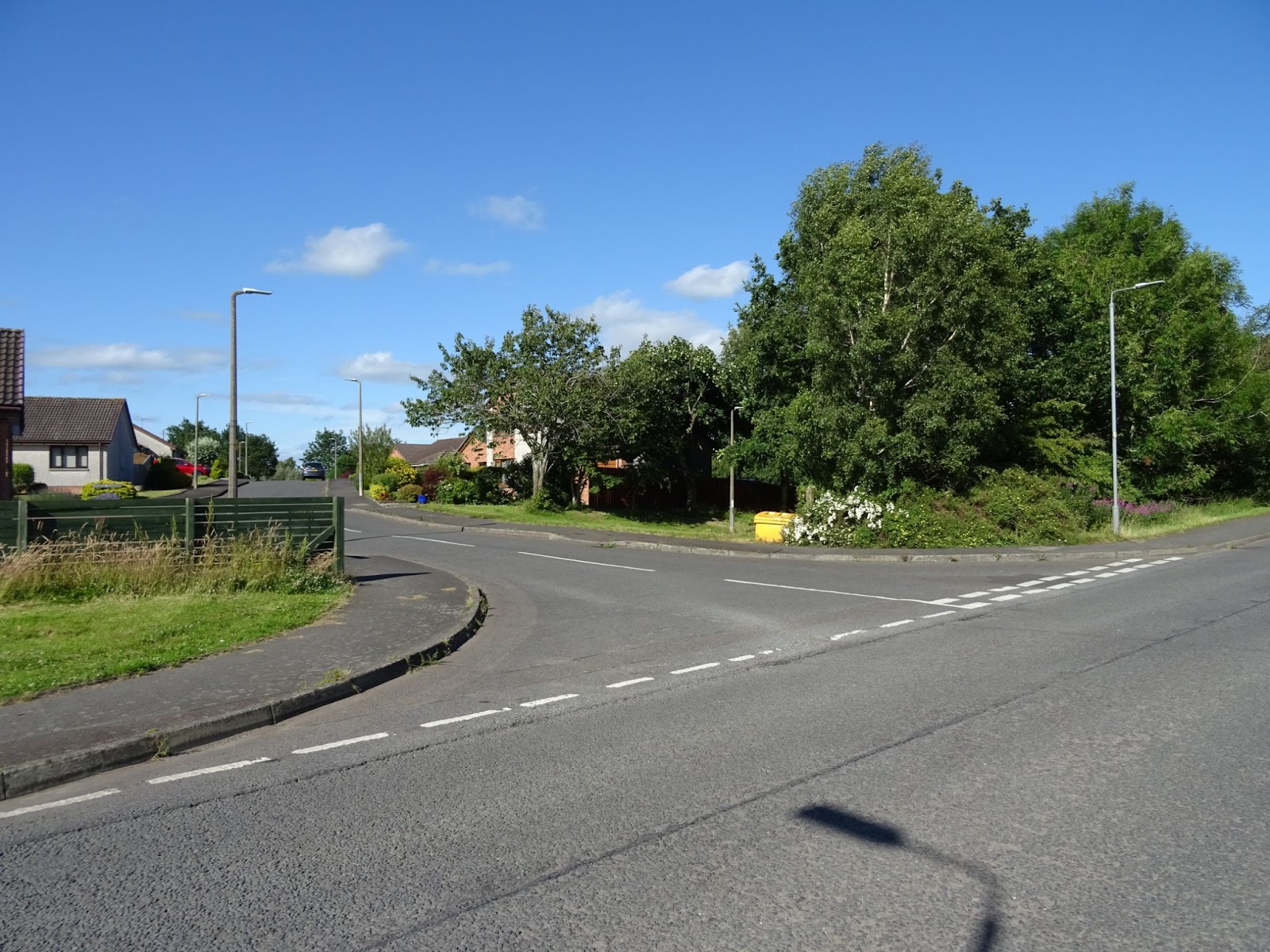 Yarrow Avenue turn off from Terregles road, with an unsigned path next to the yellow grit bin