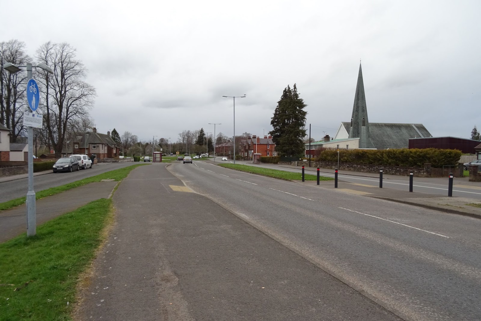 View of the dual carriageway Glasgow Street with a crossing marked only by dropped kerbs