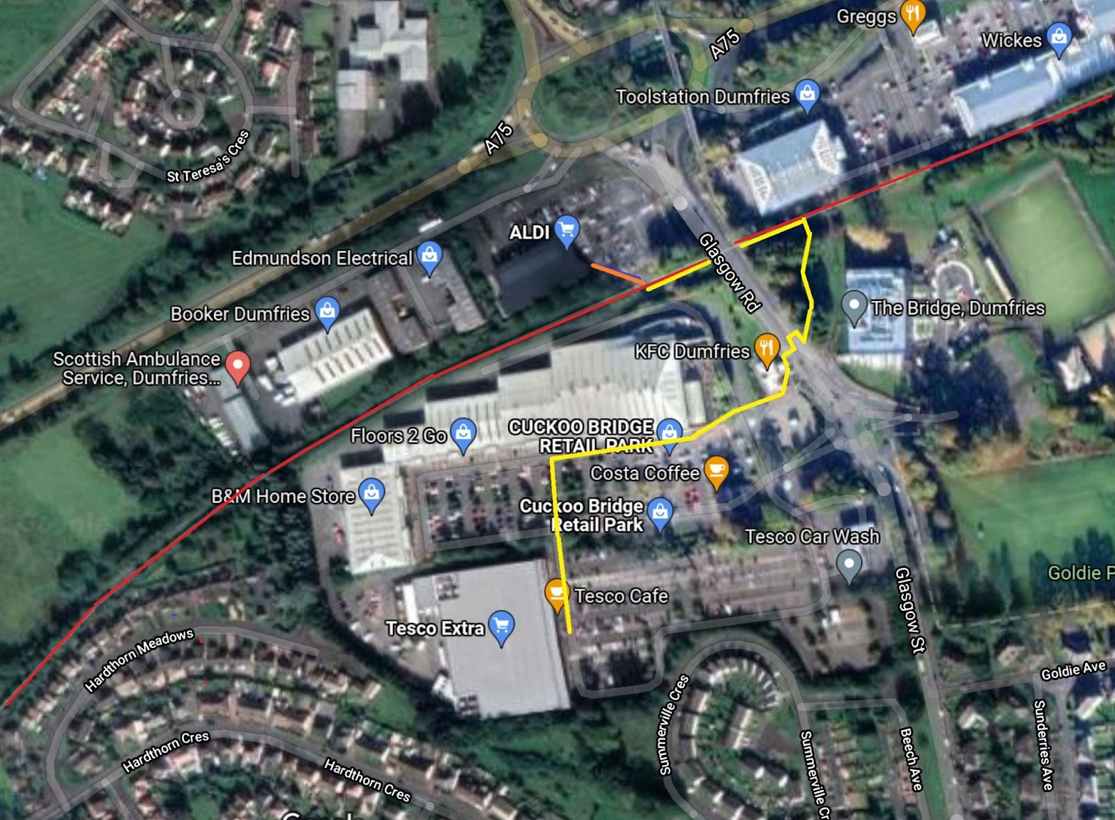 satellite view showing a short direct route to Aldi and a more convoluted yellow route to Tesco