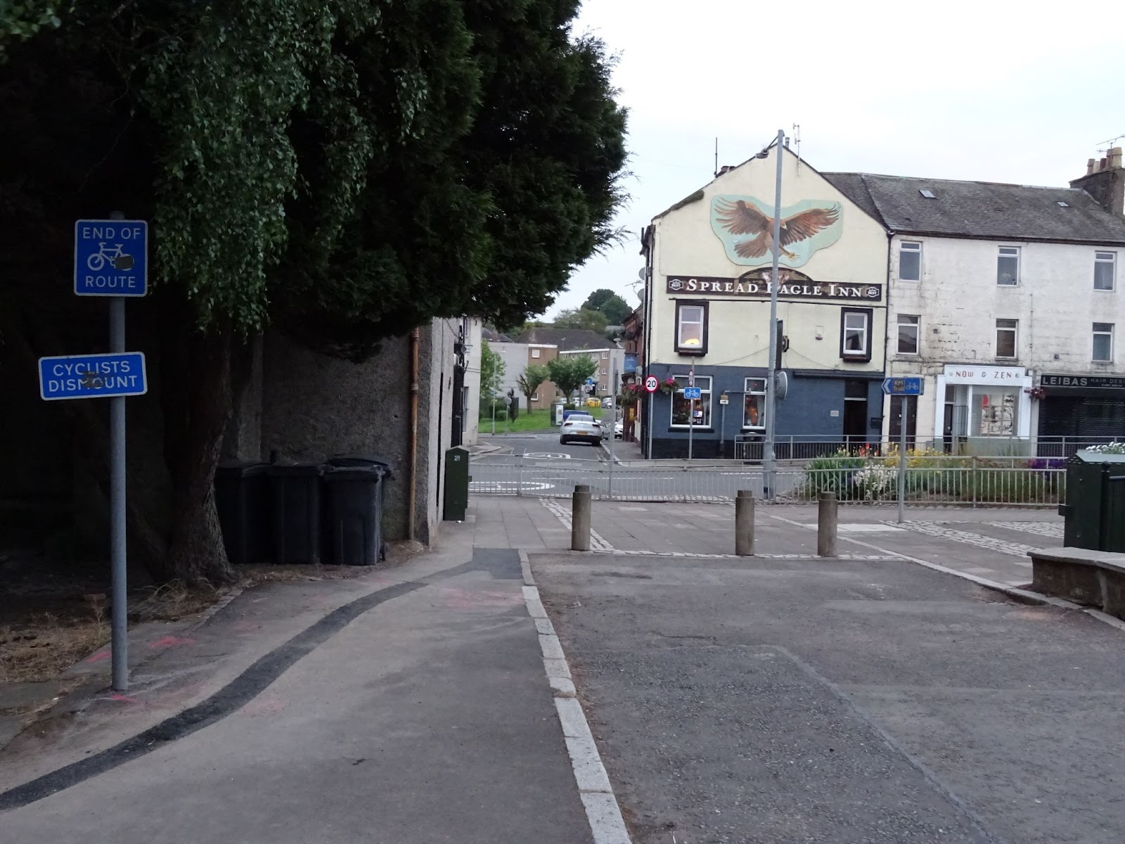 The end of College Street with pedestrian railings preventing people from crossing towards the Spread Eagle and the connecting street